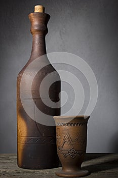 Clay bottle with wine