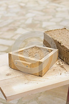 Clay brick mould bioconstruction concept
