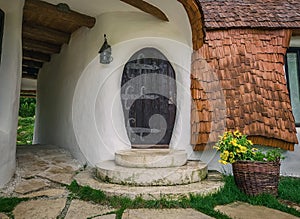 The Clay Castle from the Valley of Fairies, a touristic complex in Transylvania, Romania. Closeup view to a tiny entrance door,