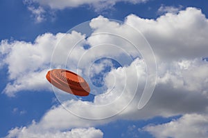 Clay disc target shooting flying on the blue sky , Clay pigeon targets game photo