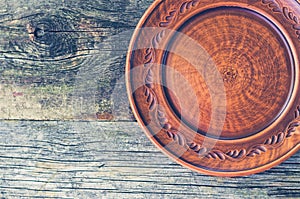 Clay dish on a wooden table