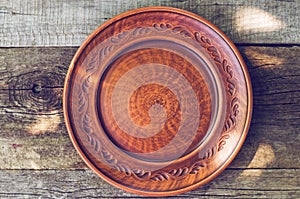 Clay dish on a wooden table