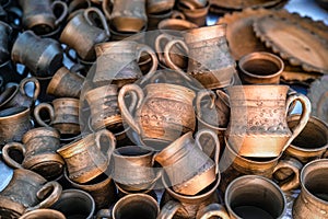 Clay dishes. Crockery made clay. Dishes background