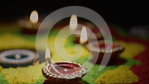 Clay diya lamps lit during diwali celebration, Diwali, or Deepavali, is India\'s biggest and most important holiday