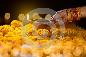 Clay diya lamps lit during diwali celebration, Diwali, or Dipawali, is India`s biggest and most important holiday photo