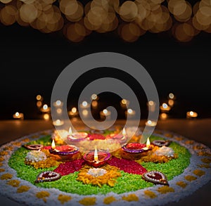 Clay diya lamps lit during diwali celebration, Diwali, or Dipawali, is India`s biggest and most important holiday