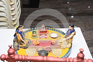 clay dolls describing Tamil brahmin couple on their wedding day