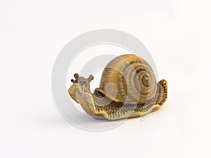 Clay figurines of crawling snail