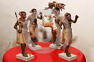 clay figurines. Traditional African hunting group with clay figurines representing the Hadza tribe in Northern Tanzania.