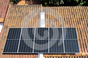 Clay house roof with solar panels