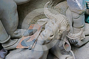 Clay idol of Asura, the demon, Kumartuli, Kolkata, West Bengal, India photo