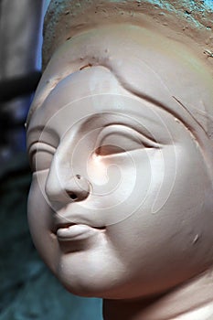 Clay idol of Hindu goddess Devi Durga. Idol of Hindu Goddess Durga during preparations in Kolkata.