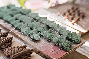 Clay leaves, pieces to make a traditional tree of life, typical Mexican crafts