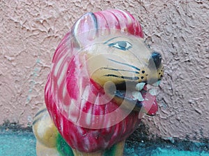 Clay lion with red color hair