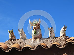 Clay livestock idol statues at the entrance to Raqch'i or Temple of Wiracocha, Peru