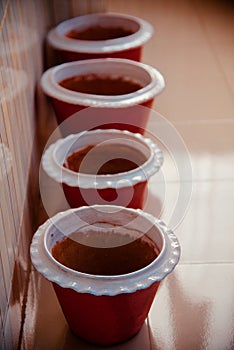 Clay made round shape pottery objects unique photo