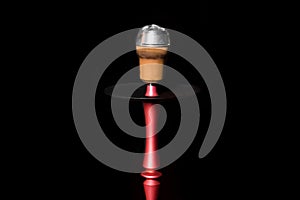 Clay object hookah head smoking on a black background