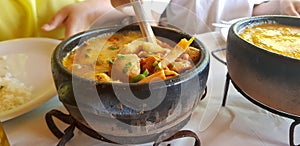 Clay pan with seafood