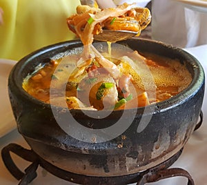 Clay pan with seafood