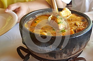 Clay pan with seafood