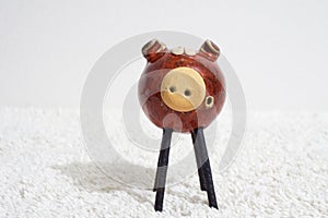 Clay pig decoration on a table.