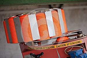 Clay Pigeon Thrower at Shotgun Range filled with orange targets - saucer
