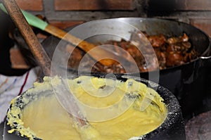 Clay pot with angu mineiro cooking in the wood oven for dinner