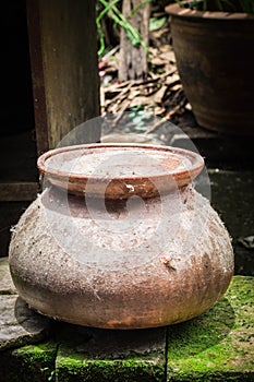 Clay pot on the brick