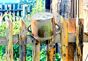 Clay pot on the fence