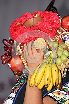 clay pot with traditional flower and fruit arrangement from Michoacan