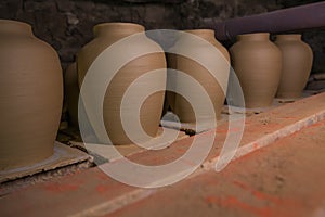 Clay pottery ceramic Products dry on shelf in workshop