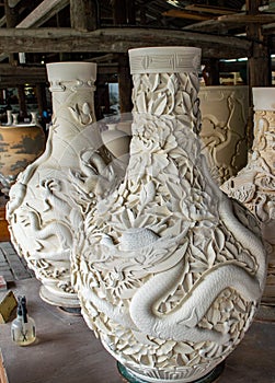Clay pottery vases in traditional pottery workshop in Jingdezhen, China