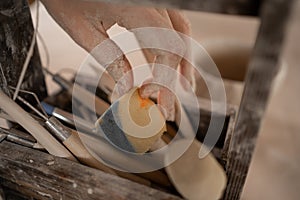 clay sculpting tool close-up on the table in the workshop.