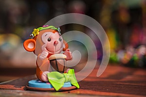 Clay-shaped orange-red monkey, toys, crafts, close-up
