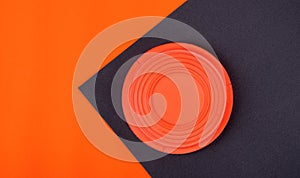 Clay target on black and orange photo