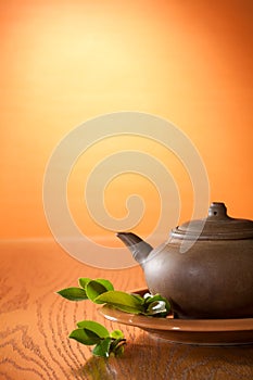 Clay teapot with greean tea