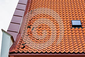 Clay tile roof damage, some fallen tiles