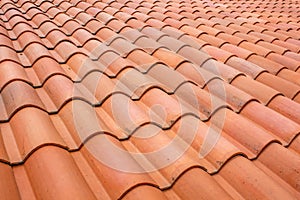 Clay tiles for roofs in perspective