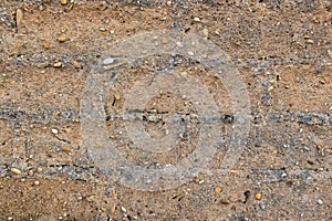 Clay wall texture with roughly built bricks
