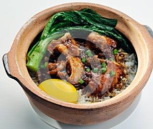 Claypot chicken rice with soy sauce vegetable