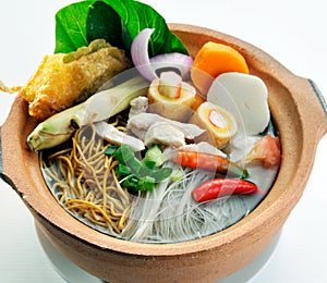 Claypot noodle soup with vegetables chinese style