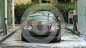 Clean automobile standing at expensive car wash, high quality auto service