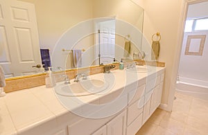 Clean bathroom with double sink in southern California