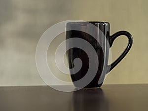 Clean clack coffee mug cup on table vintage tone