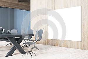 Clean contemporary meeting room interior with blank white mock up banner on wooden wall, table and chairs, decorative objetcs. 3D