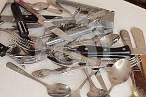 Clean cooking utensils for daily use, empty dishes on a white table background