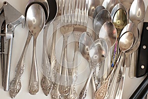 Clean cooking utensils for daily use, empty dishes on a white table background