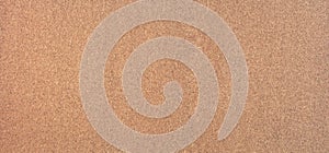 Clean cork board surface closeup, texture background