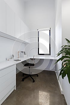 Clean crisp white study area in a contemporary home