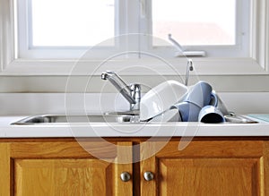 Clean dishes on kitchen sink